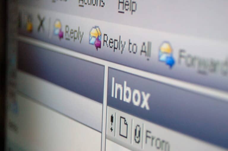 Image is of a close up email inbox screen with reply and forward options visible, concept of advertising emails and misleading subject lines in electronic communication.