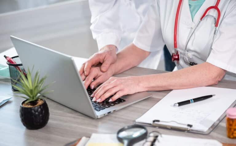 Image is of a healthcare professional in a medical setting, concept of sexual assault in Kentucky healthcare institutions and institutional liability.
