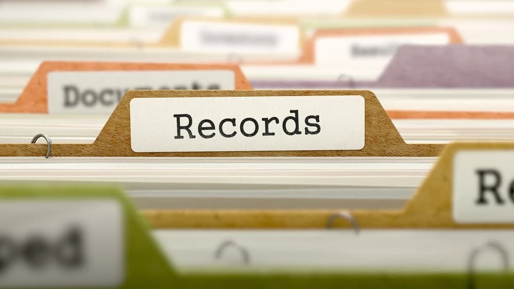 Image is of organized file folders labeled Records, concept of preserving documentation and supporting evidence for AI image abuse claims in Ohio.
